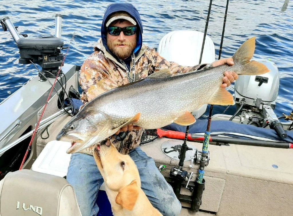 GSO Fishing - Guide Hunter Pierson caught a beautiful lake trout with his golden retriever puppy