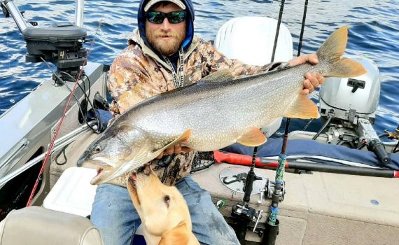 GSO Fishing - Guide Hunter Pierson caught a beautiful lake trout with his golden retriever puppy