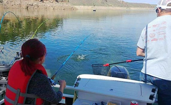 GSO Fishing Owner & Daughter Trolling and reeling in fish with Velocity Rods on Blue Mesa Reservoir