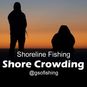 Shore Crowding: Anglers fishing at sunset close together on the shoreline.